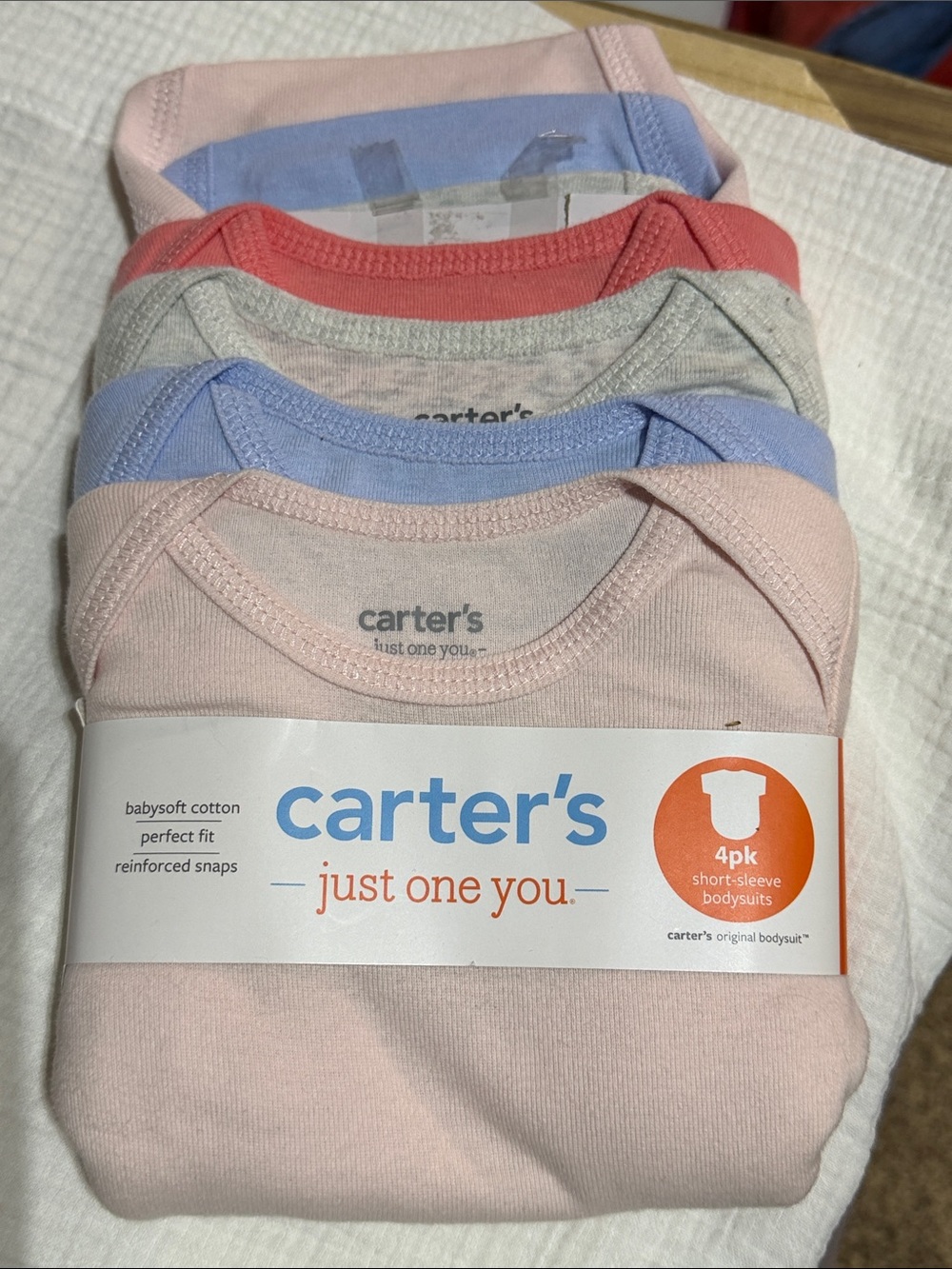 Carter's 4-Pack Short-Sleeve Bodysuits in Pink, Coral, Gray, Blue